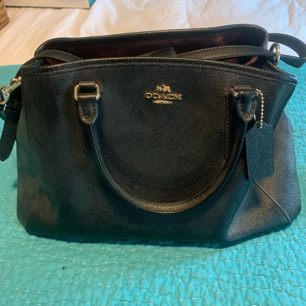 Leather coach handbag. Suede interior.